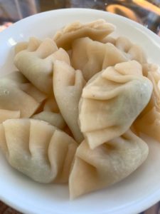 A bowl of polymer clay dumplings called jiaozi in China, created for the purpose of chopstick transfer work in my Montessori classroom. 