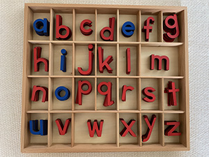 wooden box with compartments for wooden letters