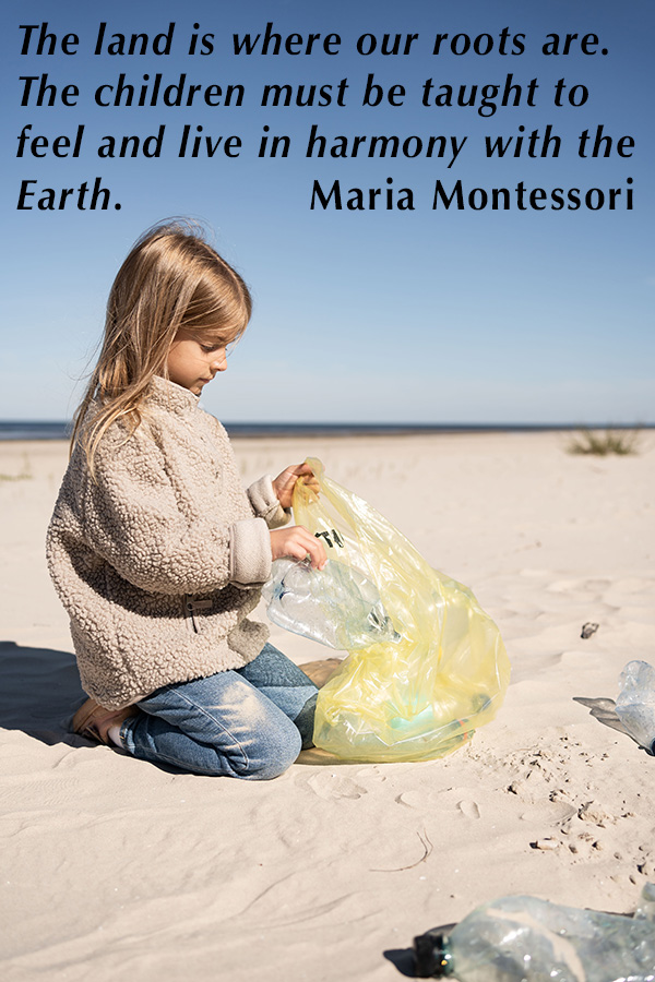 Young girl on the beach collecting litter to recycle and care for the environment
